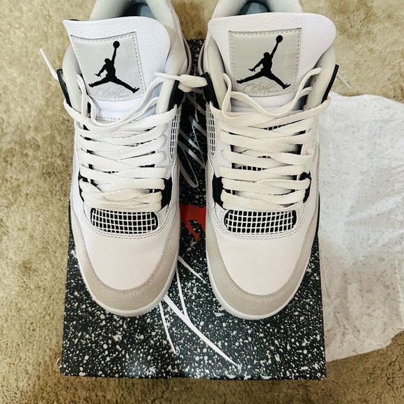 Nike White and Black Sneakers with Iconic Design